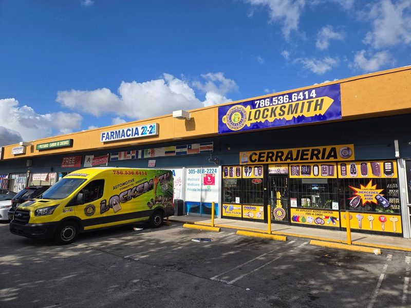 Cayman Locksmith storefront on W 12 Avenue, Hialeah, with the service van parked outside